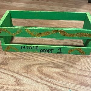 Wooden shelf to hold “animals” for adoption- party favors